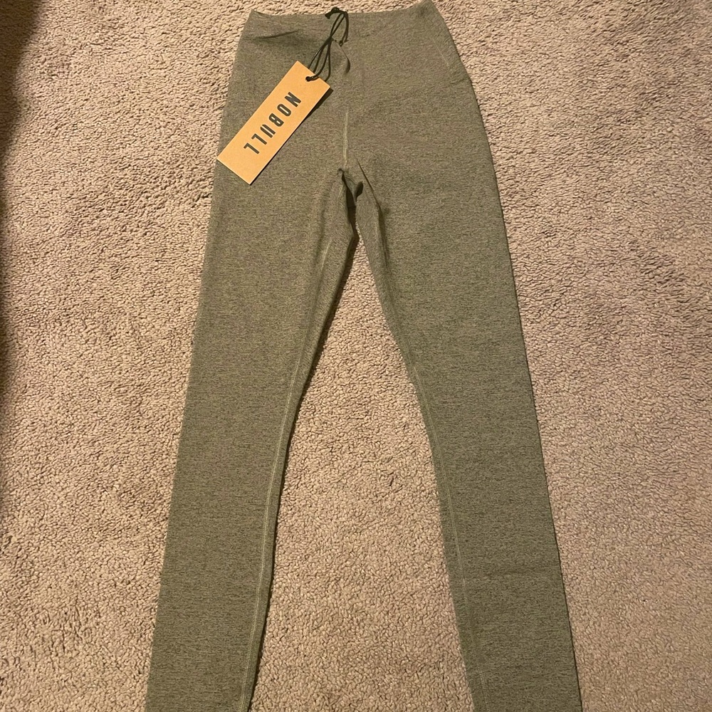 Brand New with tags. Never worn.  XS Nobull tight.